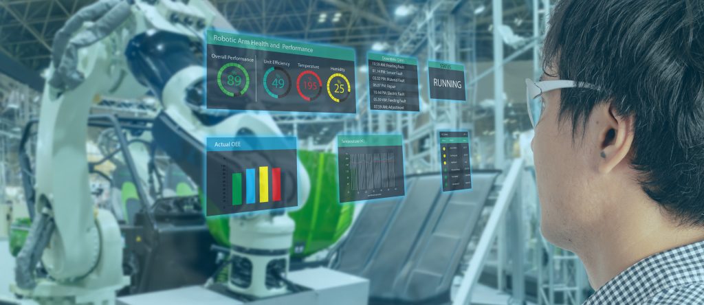 Industrial engineer using smart glasses with augmented reality to monitor factory systems — representing AI-powered predictive maintenance in Industry 4.0.